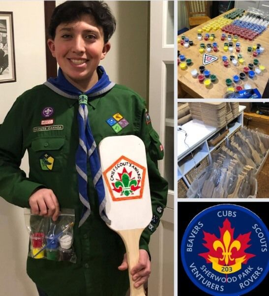 Max showcasing some of his Chief Scout capstone project paddles.