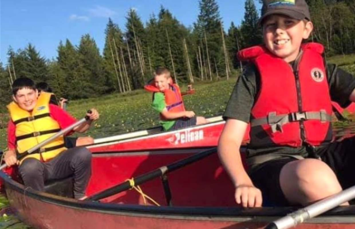 Three young Scouts from 1st Haney set out in their canoes on Whonnock lake to enjoy some canoeing and kayaking.