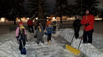 North Battleford Scouts shovel snow ahead of Remembrance Day